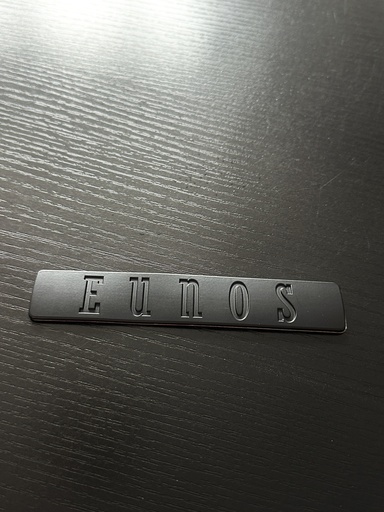 Black Eunos Logo